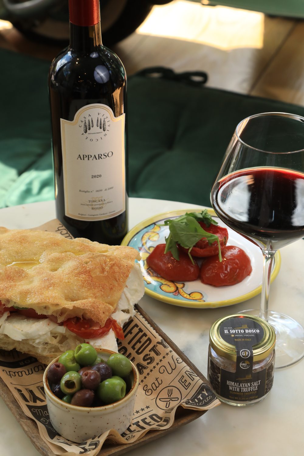 Focaccia, olives and a glass of red wine